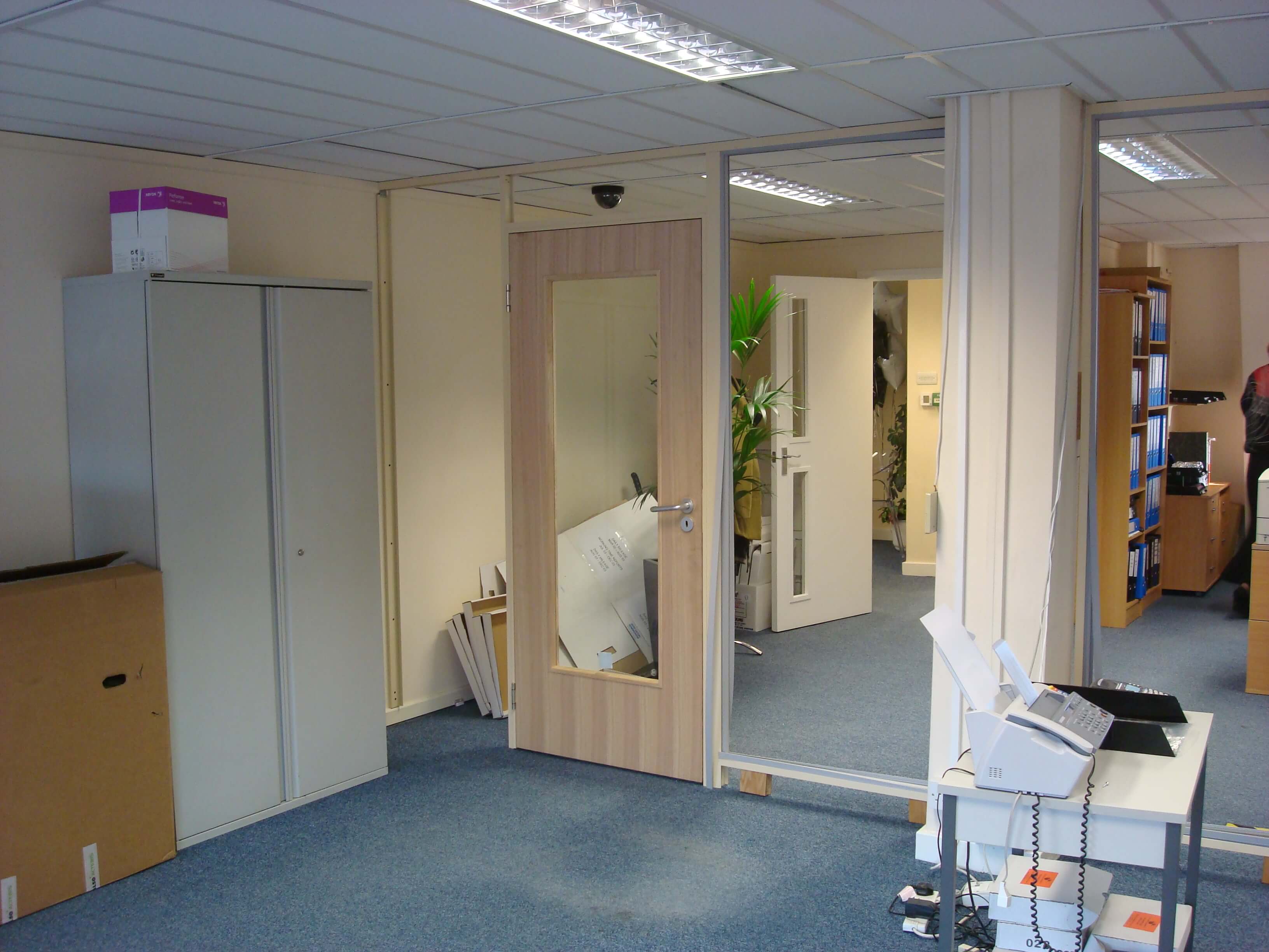 New door installed to same size as the existing one further in the office.