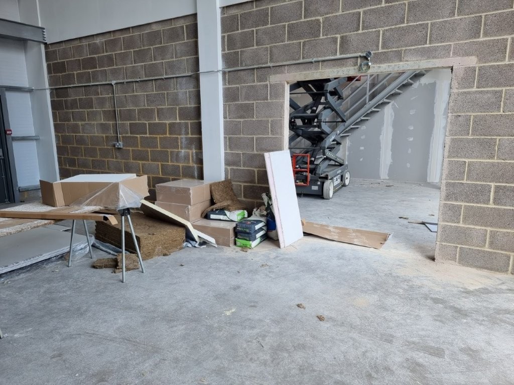 Knocking through next door