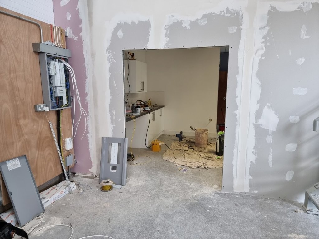 Forming of opening in main wall.