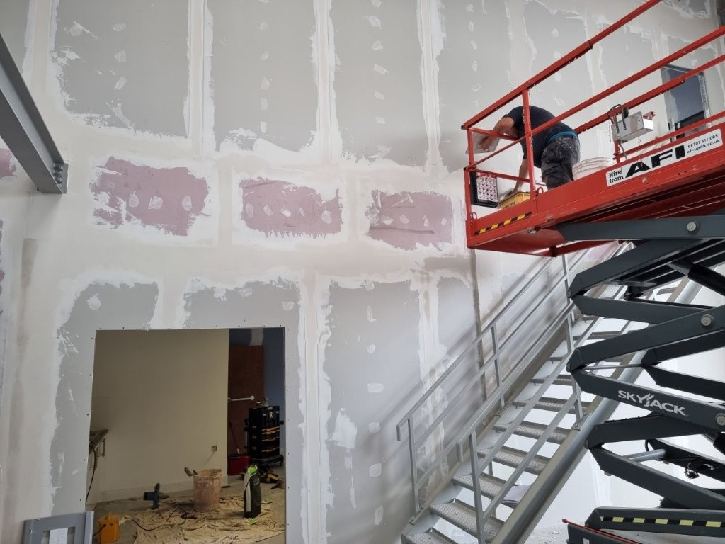 Fireline board on mezzanine edge.