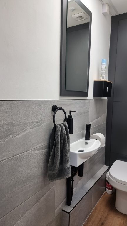 Half tiled to reduce costs