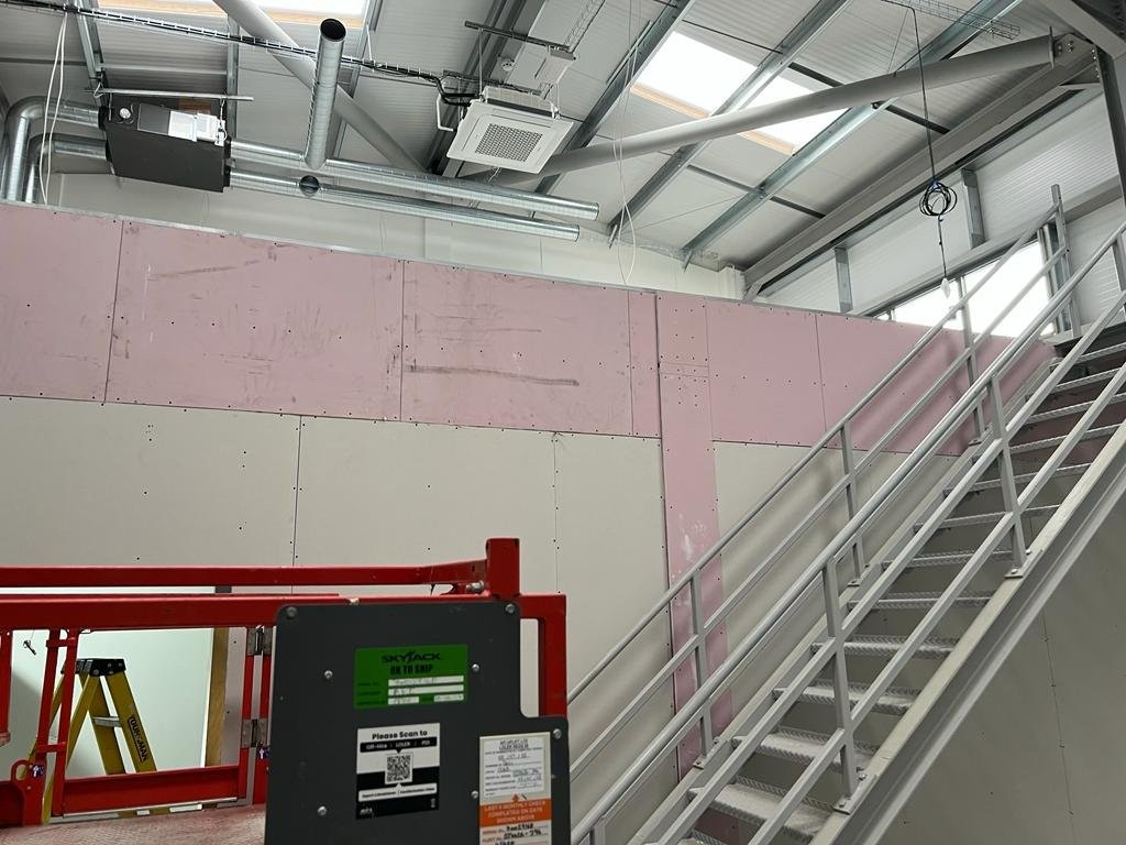 Fireline board on mezzanine and pillars