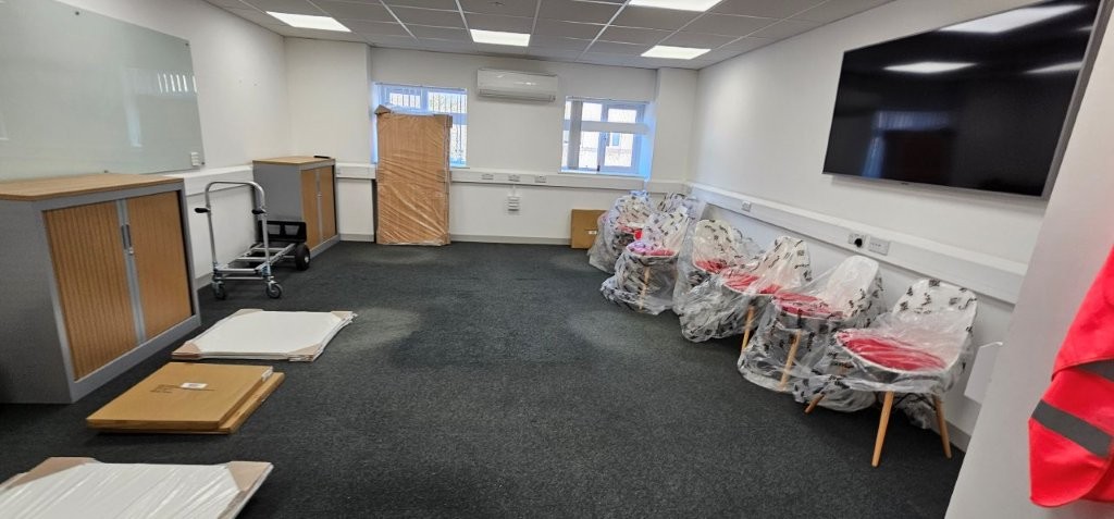 Meeting room chairs came bagged and tables ready to assemble