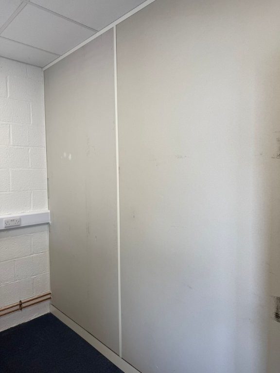 Low cost Partition Dividing Wall to an Existing Office.