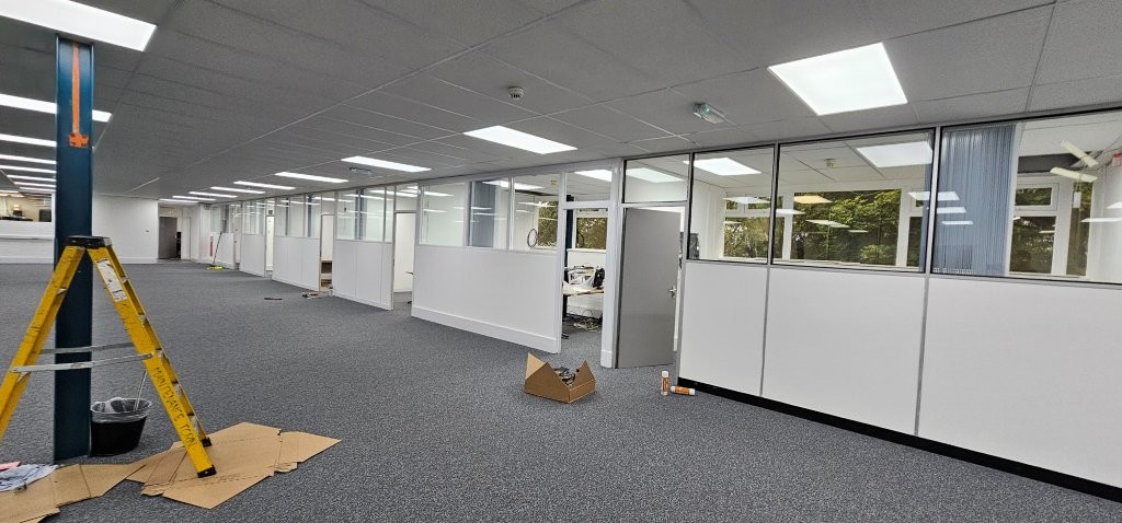 small office partitions re-decorated with grey gloss doors