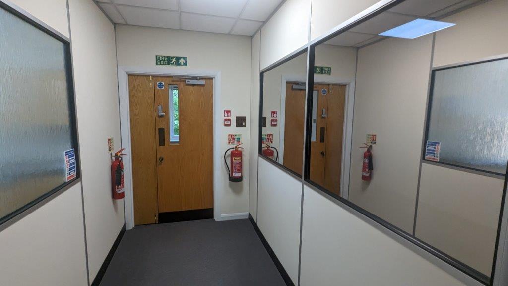 Dated looking doors with brown ironmongery